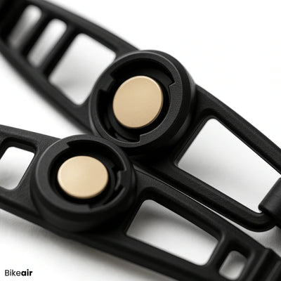Nærbillede af Bikeair lysstropper i sort gummi med guldcenter – ekstra stropper til Bikeair Mini Lights.