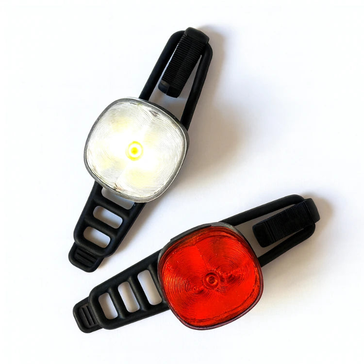Bikeair Mini Lights for- og baglygter med monterede gummistropper.